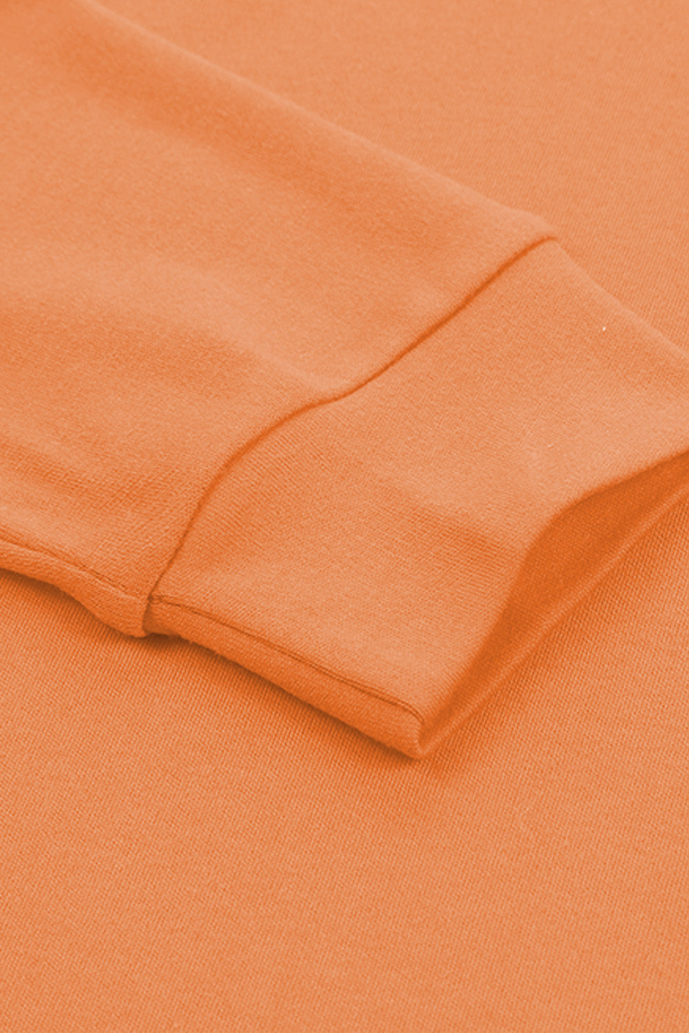 Top naranja liso de manga larga con cuello redondo