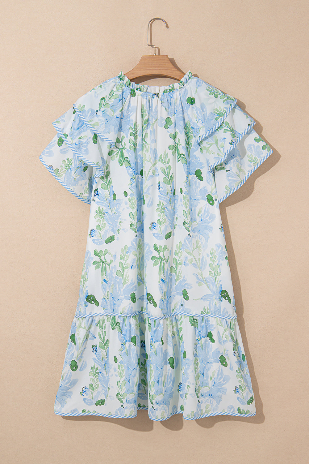 Minivestido con cuello anudado, manga con volantes en el borde en contraste y estampado floral azul cielo