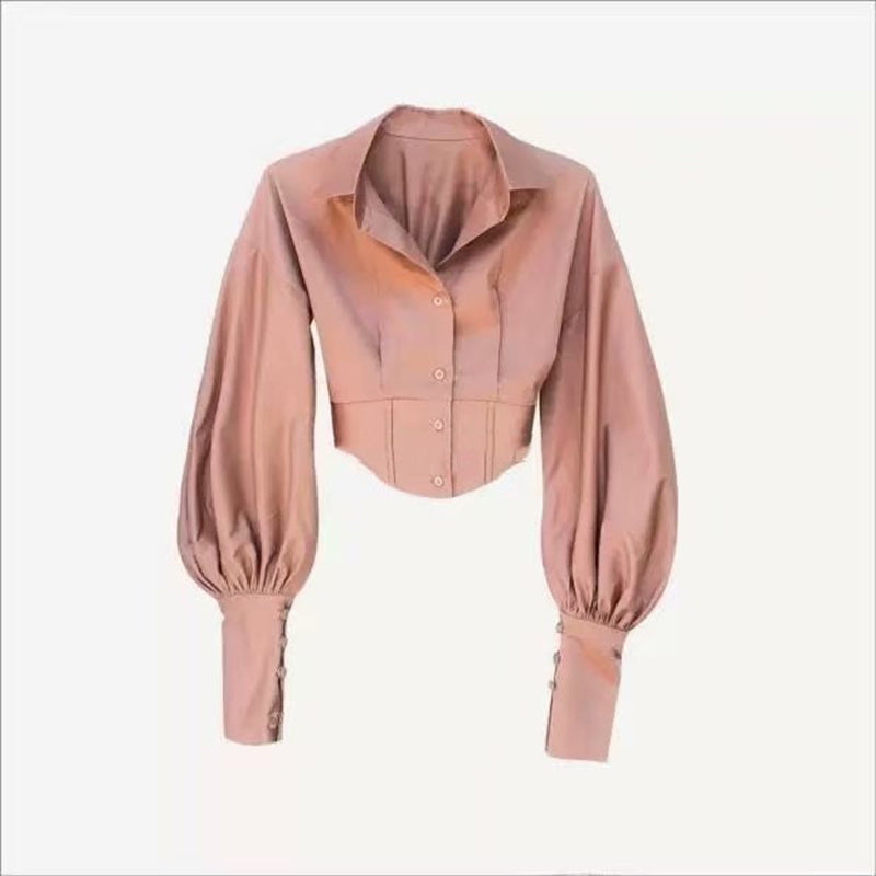 Camisa de mujer con cuello, lazo en la cintura y mangas globo. Consultar la tabla de tallas en "más detalles".