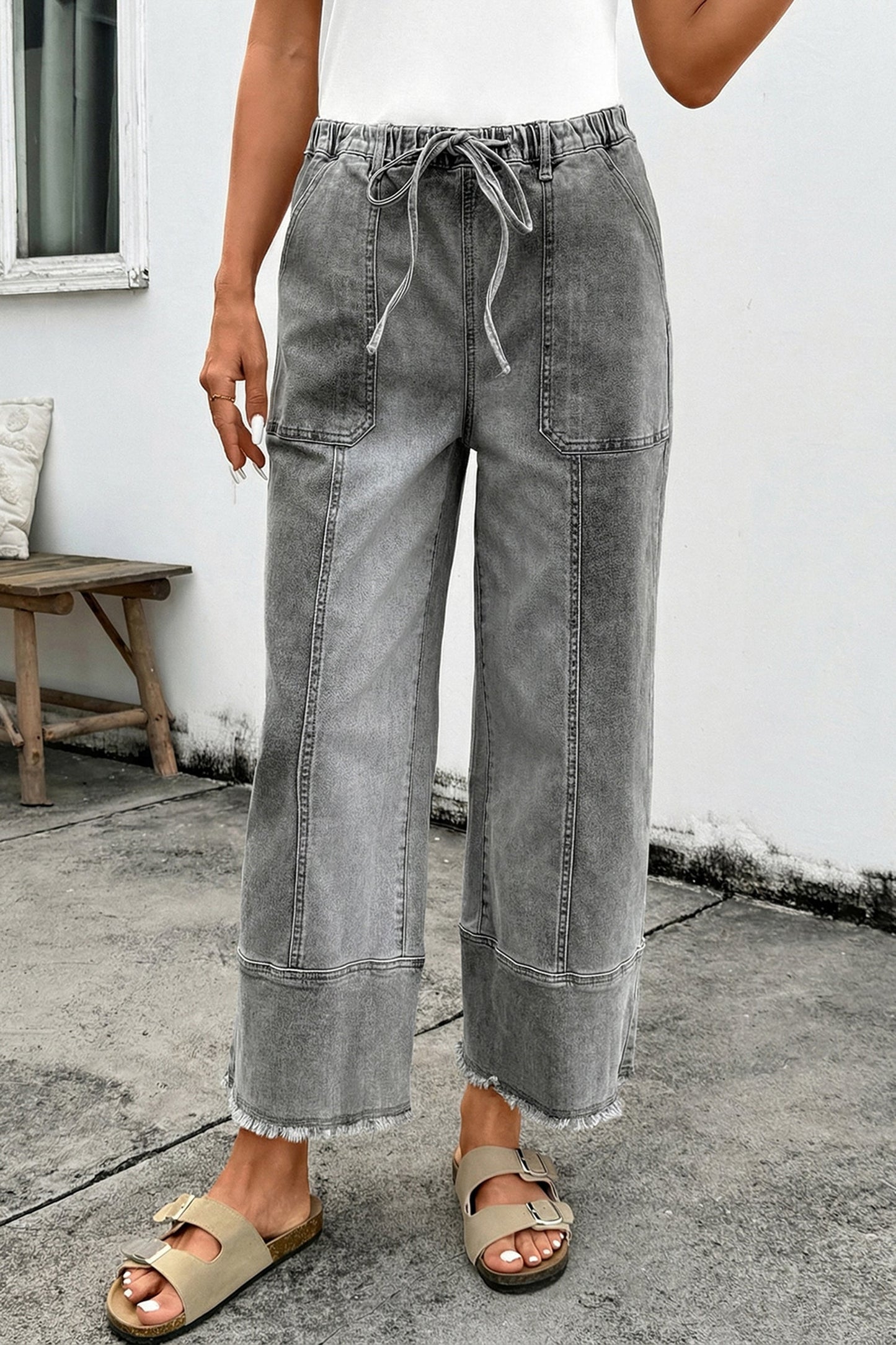 Pantalones vaqueros de pierna ancha con cordón azul de Prusia, detalle de costura y dobladillo sin rematar