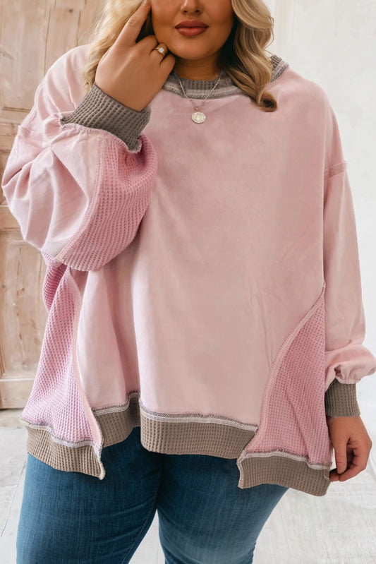 Sudadera holgada color rosa claro con bloques de color, diseño de gofre, retazos y costuras expuestas