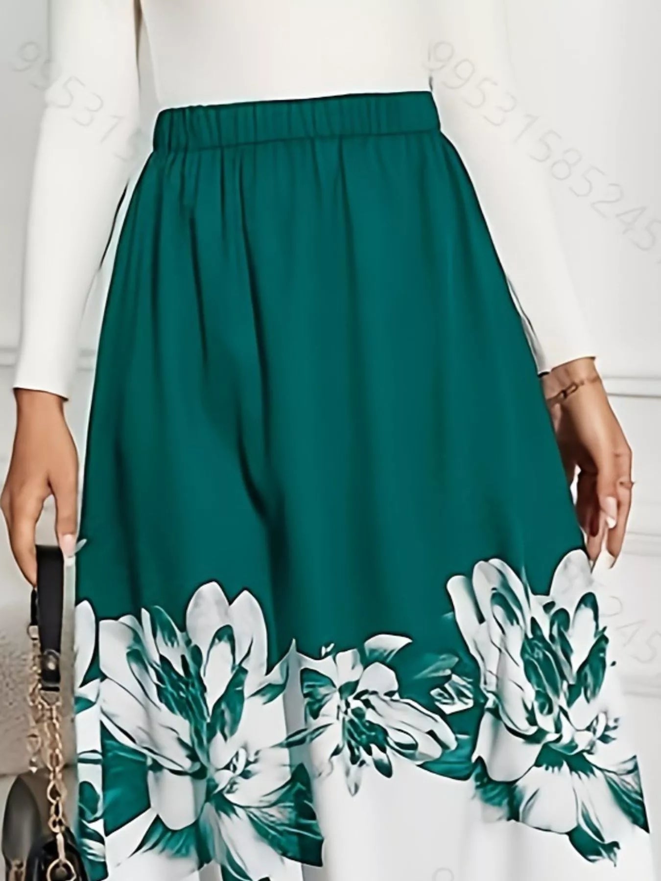 Falda Midi Evasé con Estampado Floral Ver tabla de tallas en "más detalles"