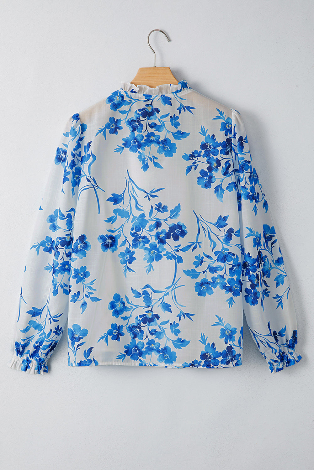 Blusa Azul Floral de Manga Larga con Cuello V y Cordones