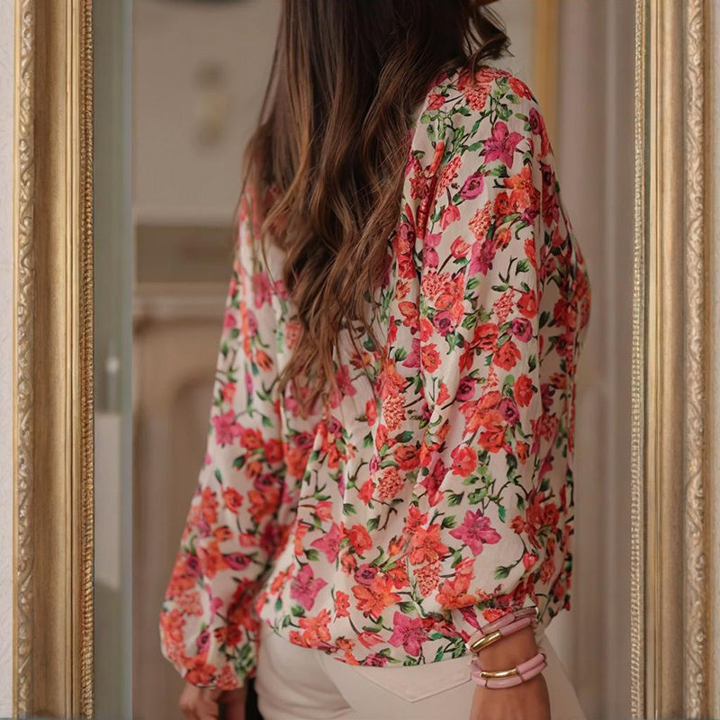 Blusa bohemia floral con cuello en V y cordón ajustable