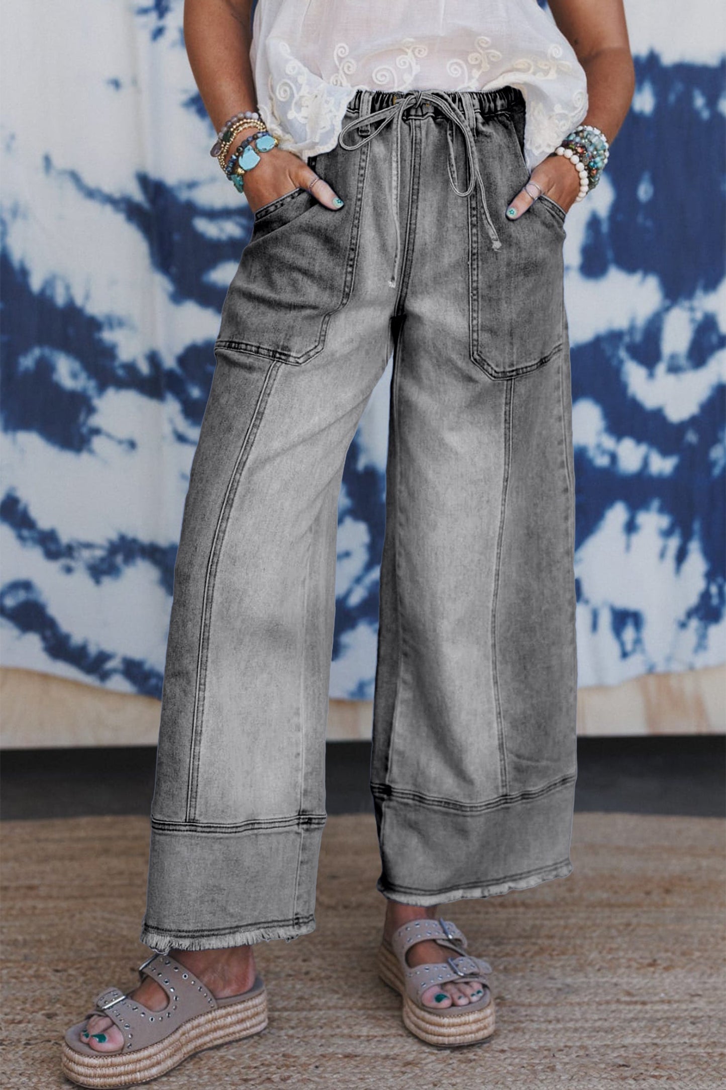 Pantalones vaqueros de pierna ancha con cordón azul de Prusia, detalle de costura y dobladillo sin rematar