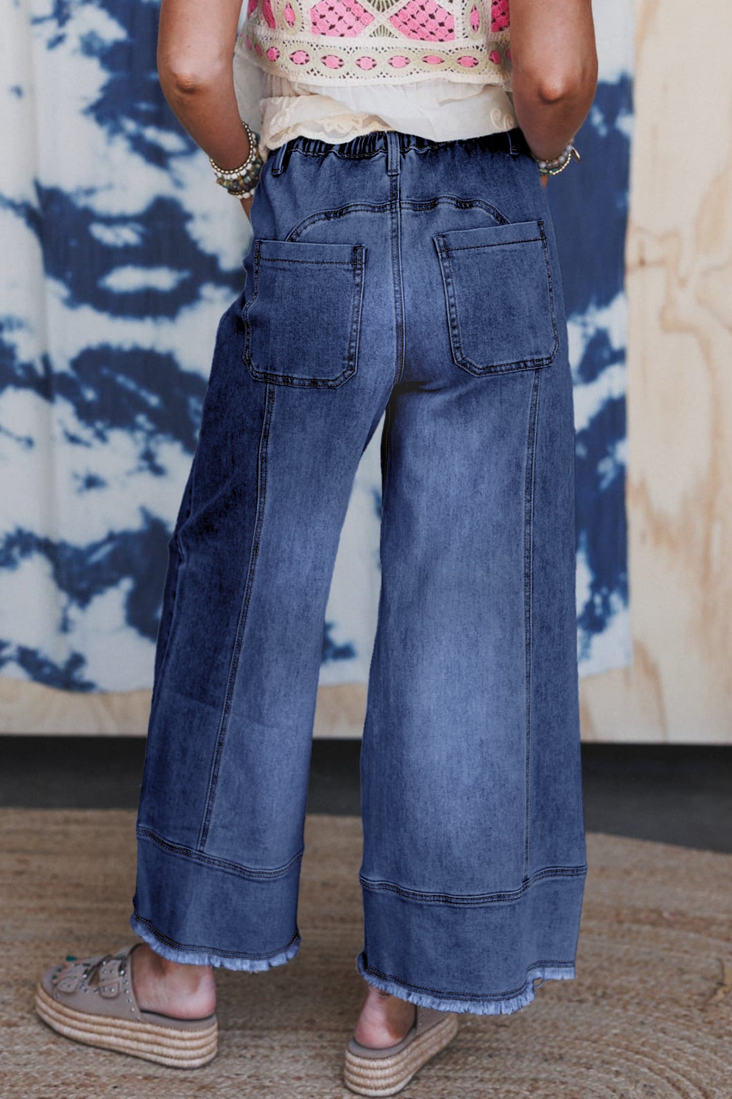 Pantalones vaqueros de pierna ancha con cordón azul de Prusia, detalle de costura y dobladillo sin rematar