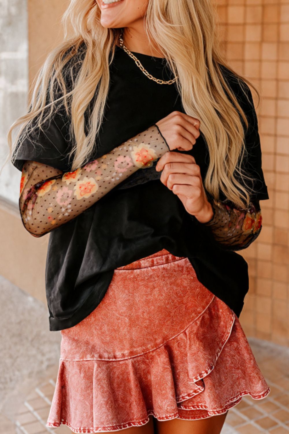 Top de manga larga patchwork floral efecto dos piezas