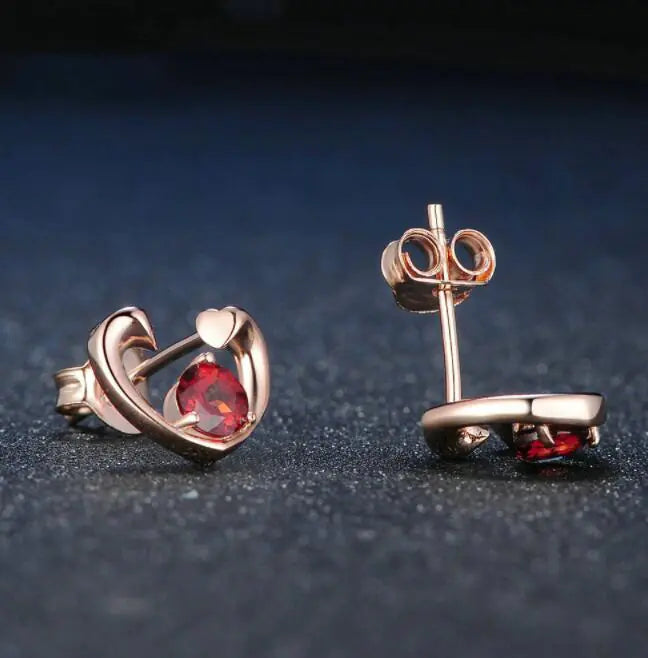 Aretes de gema en oro rosado de plata 925