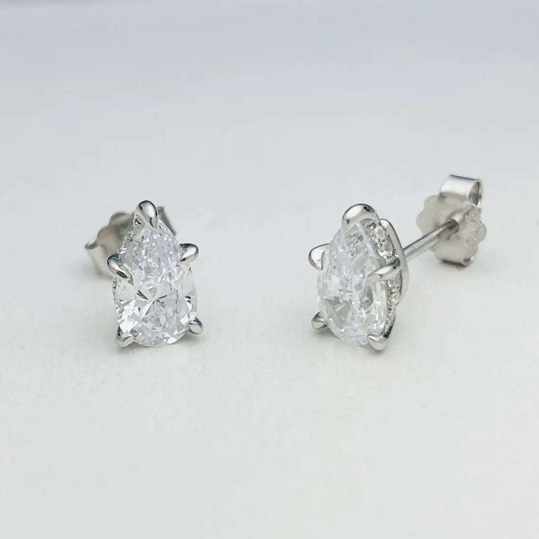 Pear Moissanite Stud Earrings in Sterling Silver