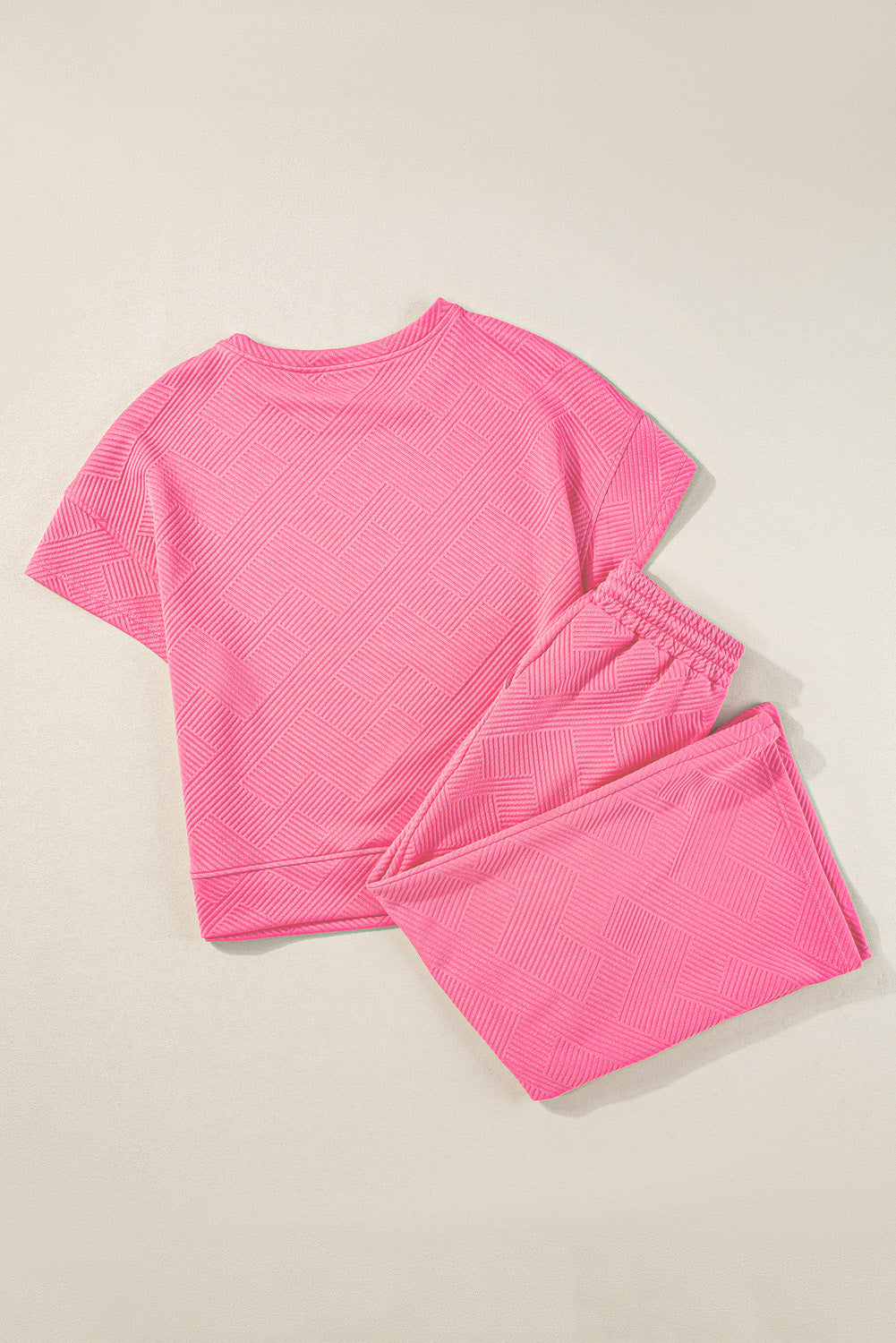 Conjunto de camiseta rosa fresa texturizada de corte holgado y pantalones con cordón