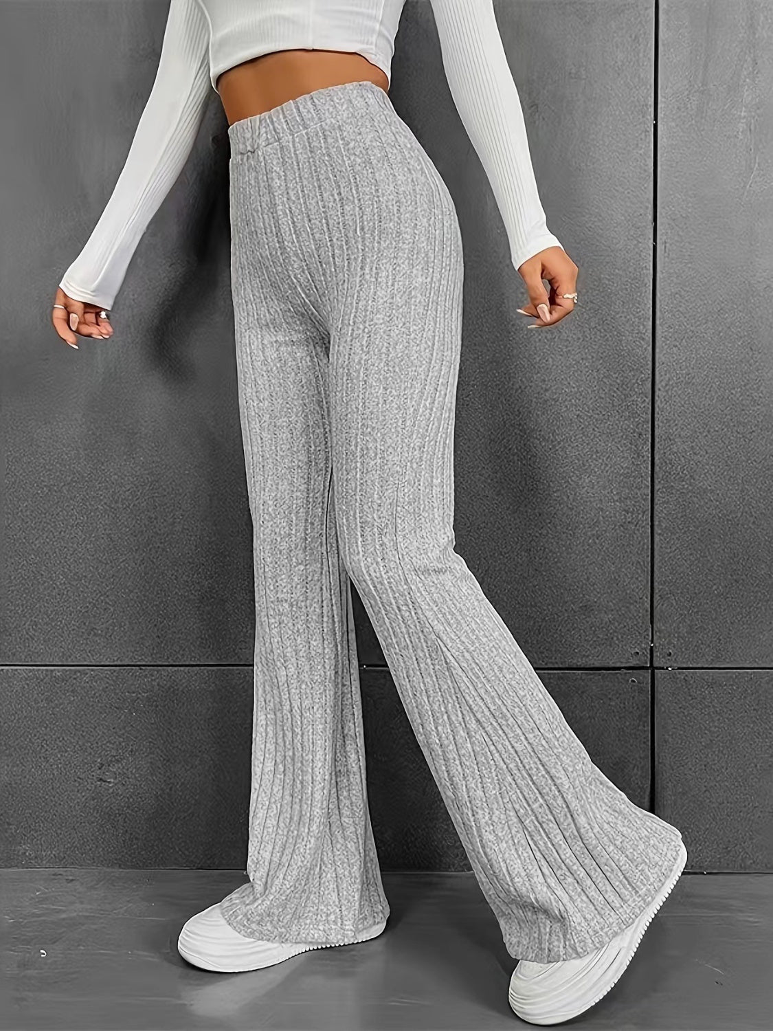 Pantalones acanalados de cintura alta con corte de bota