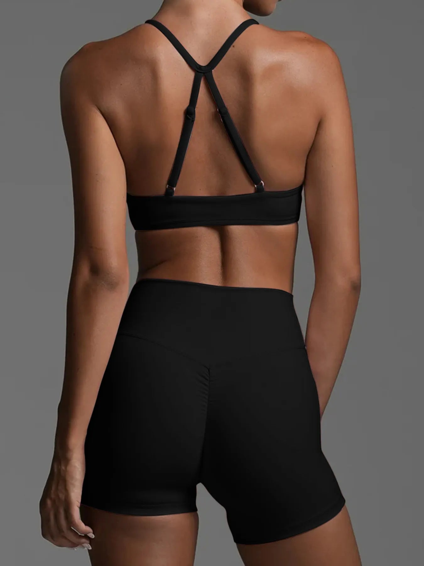 Conjunto deportivo de top ruched y shorts de tiro alto