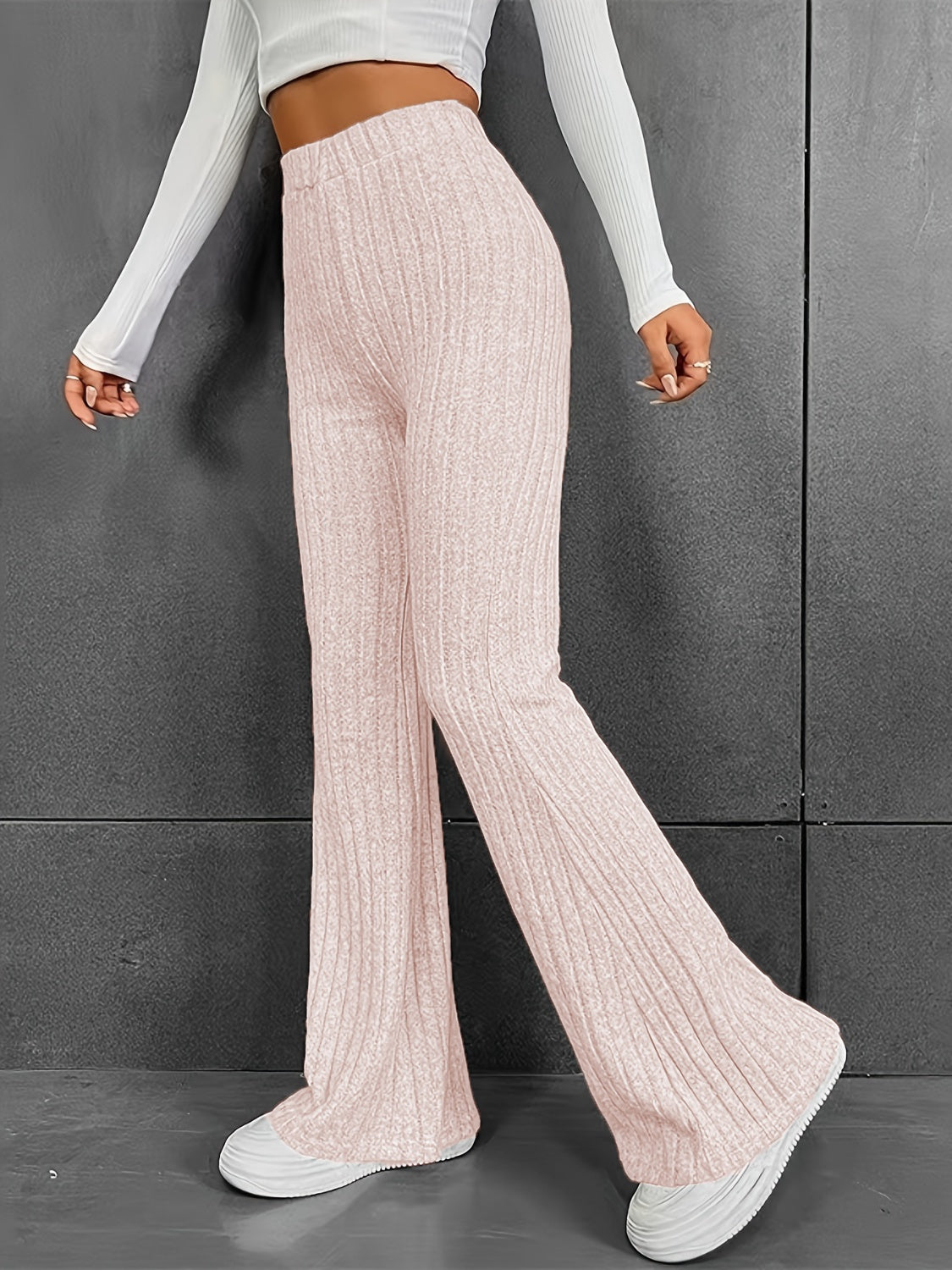 Pantalones acanalados de cintura alta con corte de bota