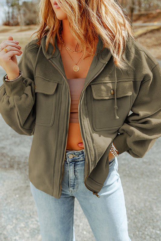 Chaqueta con capucha y cremallera, mangas obispo y bolsillos de solapa verdes