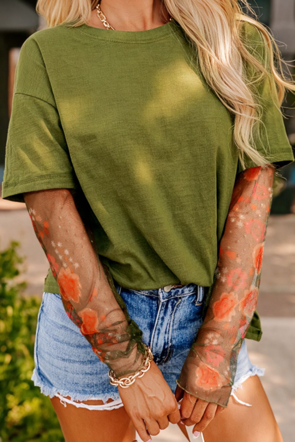Top de manga larga patchwork floral efecto dos piezas