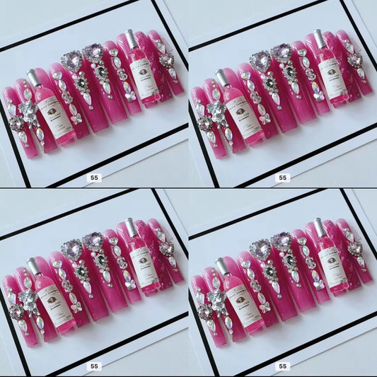 Pink acrylic press on nails with champagne