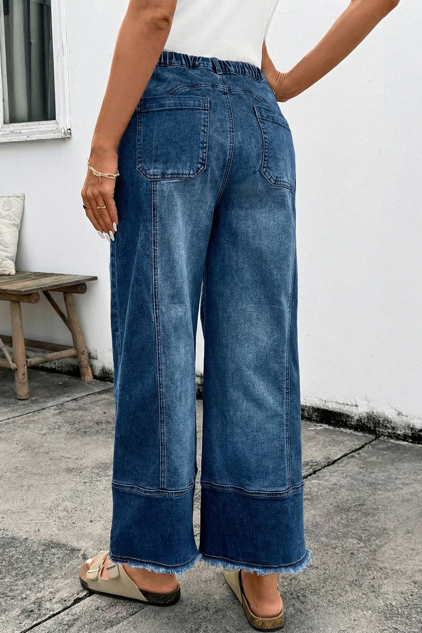 Pantalones vaqueros de pierna ancha con cordón azul de Prusia, detalle de costura y dobladillo sin rematar