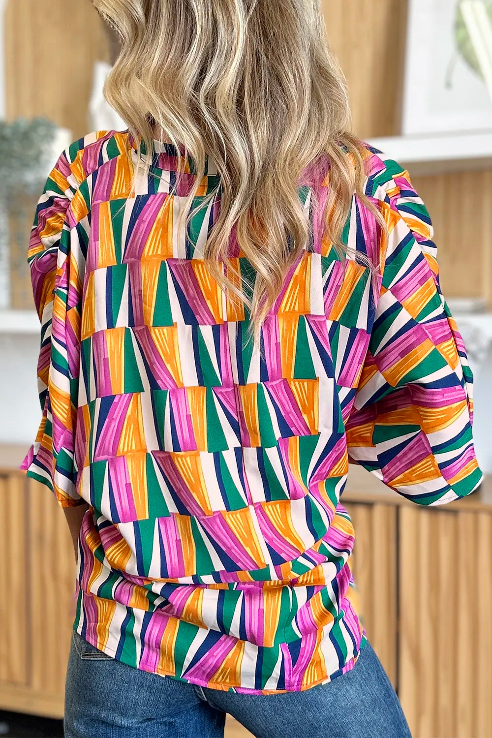 Top de manga dolman con muescas y estampado geométrico "Double Take" de talla grande