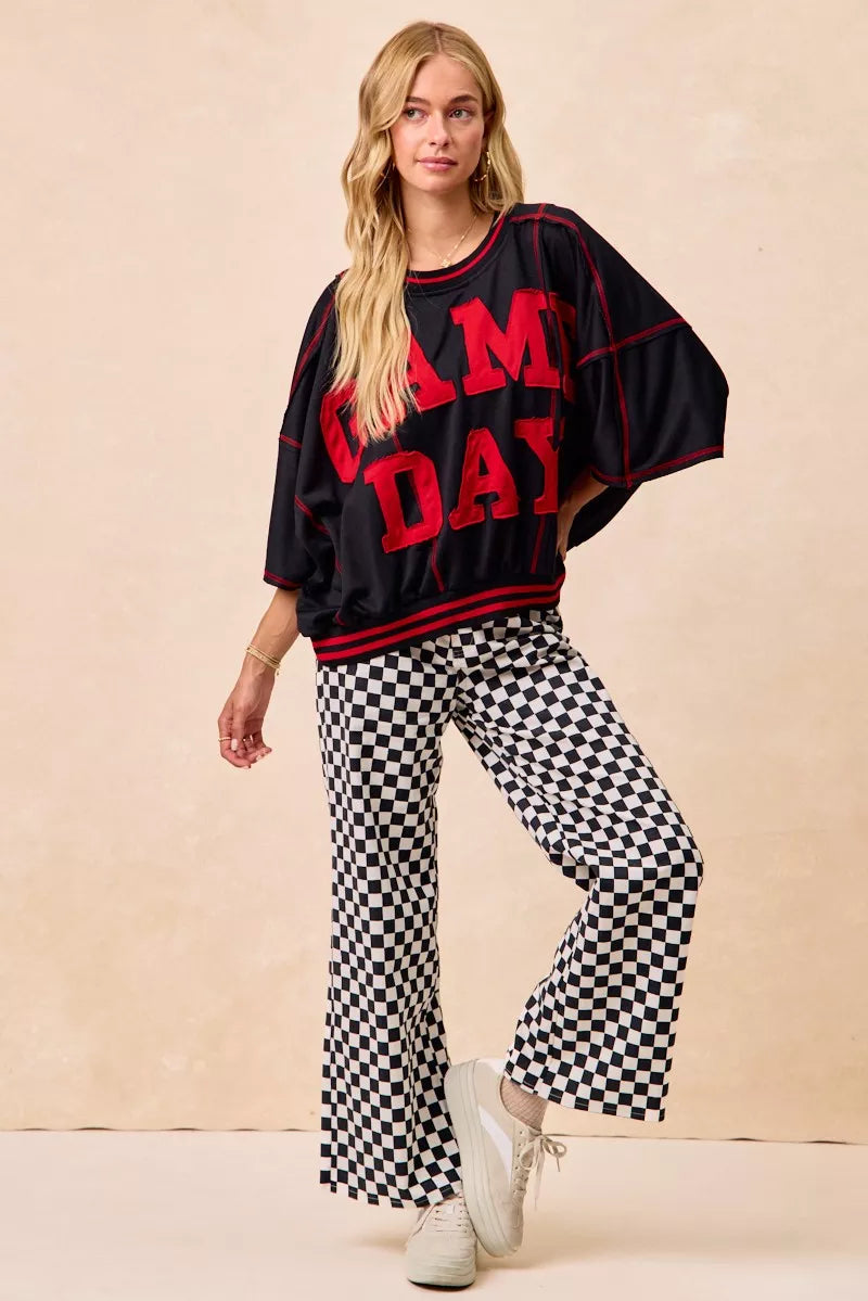Pantalones con estampado a cuadros temáticos de día de partido de BiBi
