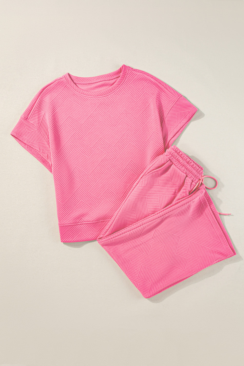 Conjunto de camiseta rosa fresa texturizada de corte holgado y pantalones con cordón