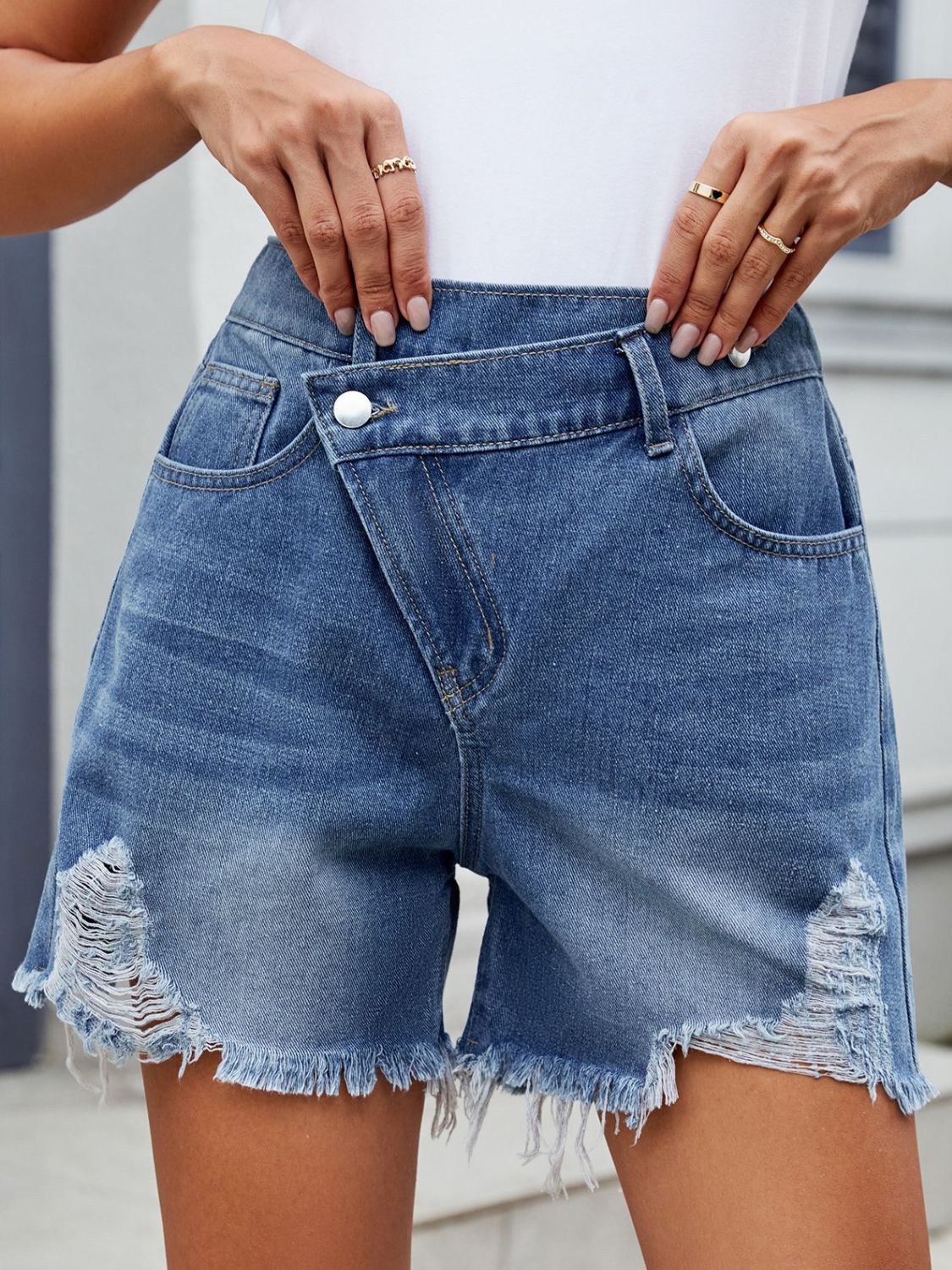 Distressed Raw Hem Asymmetrical Waist Denim Shorts