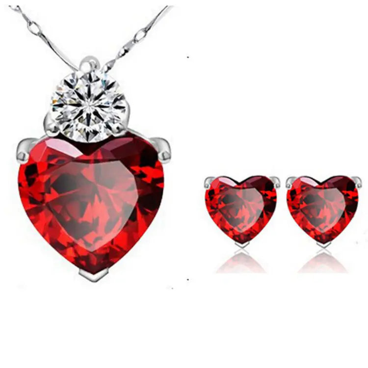 Conjunto de pendientes y collar con circonitas en forma de corazón