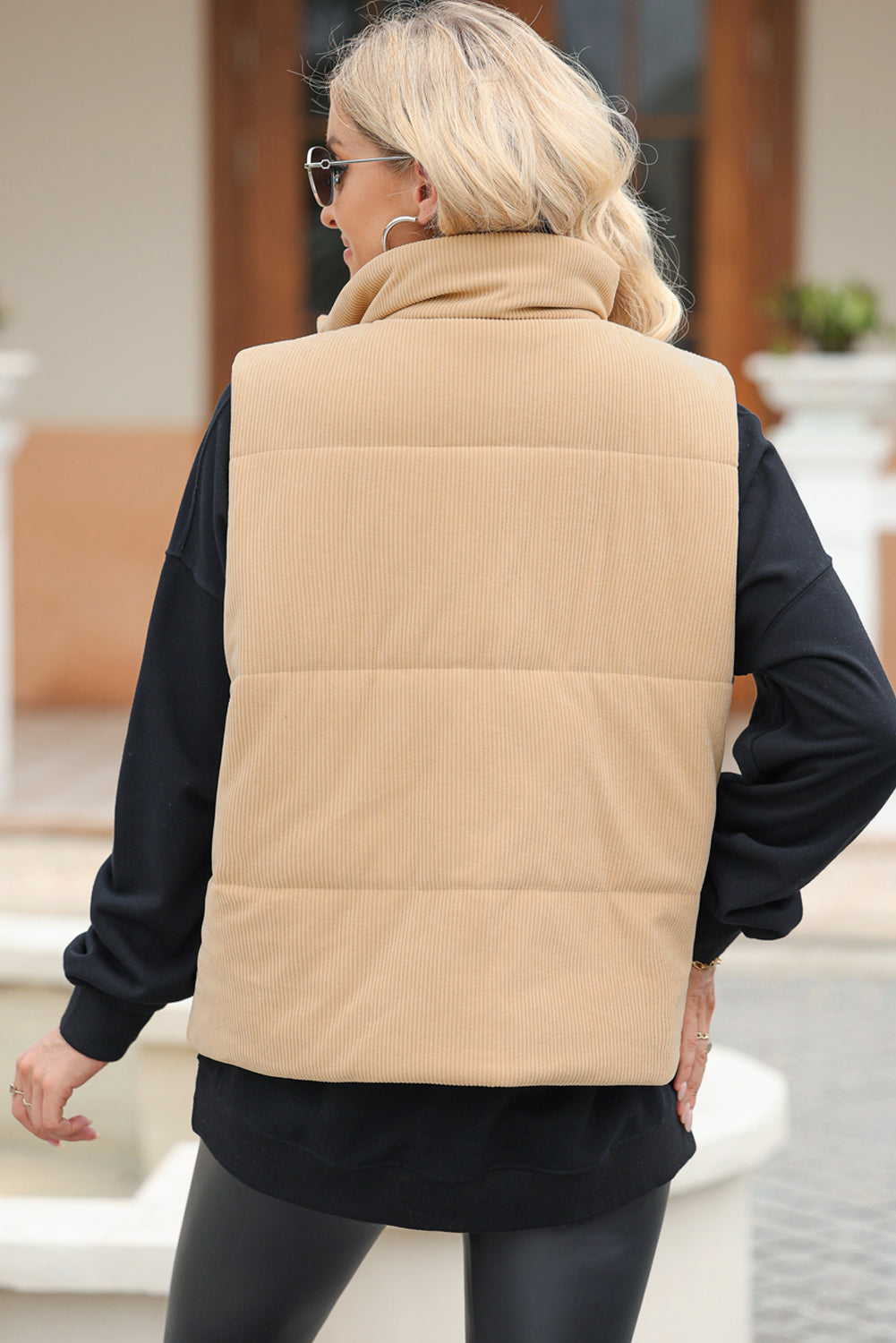 Chaleco abrigado de cuello alto con cremallera y bolsillos