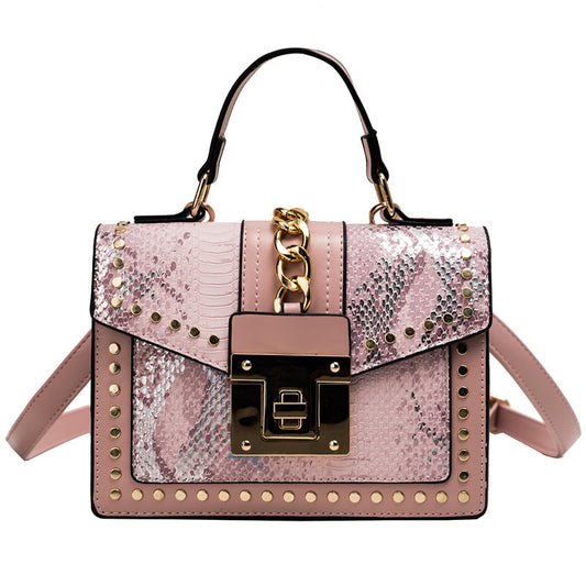Bolso de moda con estampado de serpiente. Consulta la tabla de tallas en "más detalles".