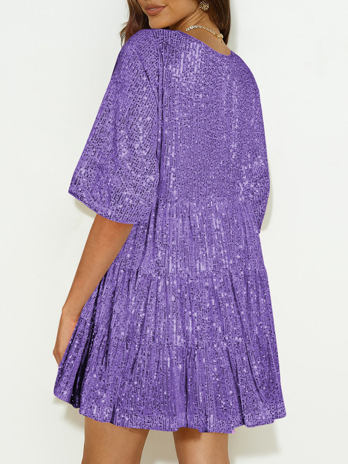 Minivestido de lentejuelas de cuello redondo y manga corta