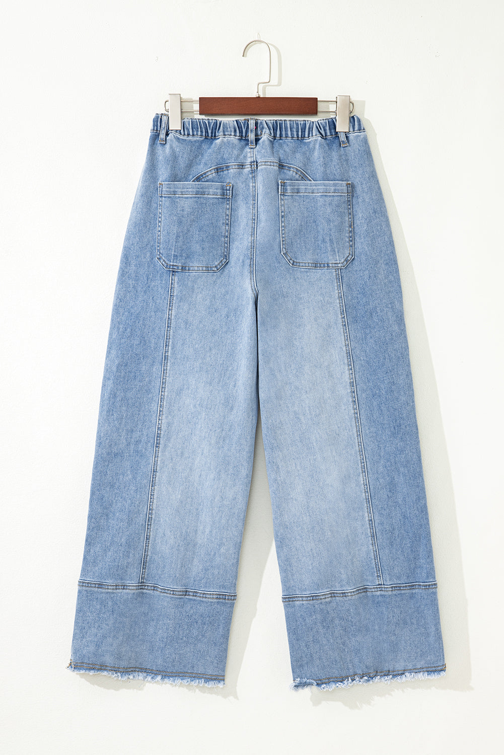 Pantalones vaqueros de pierna ancha con cordón azul de Prusia, detalle de costura y dobladillo sin rematar