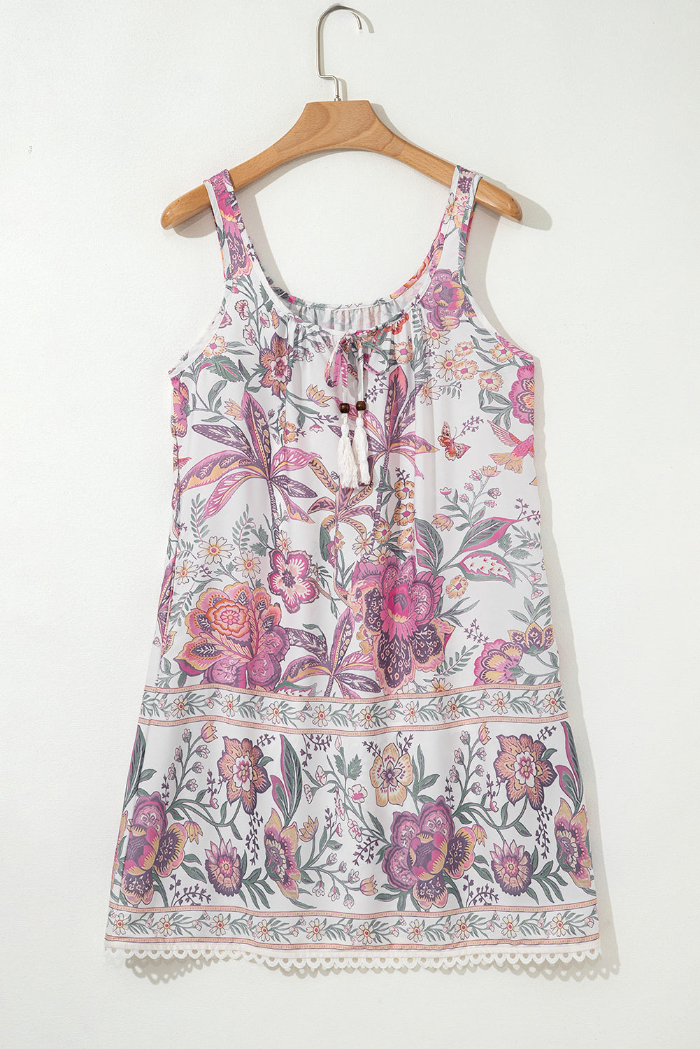 Minivestido sin mangas con cuello de lazo con estampado floral multicolor y flecos