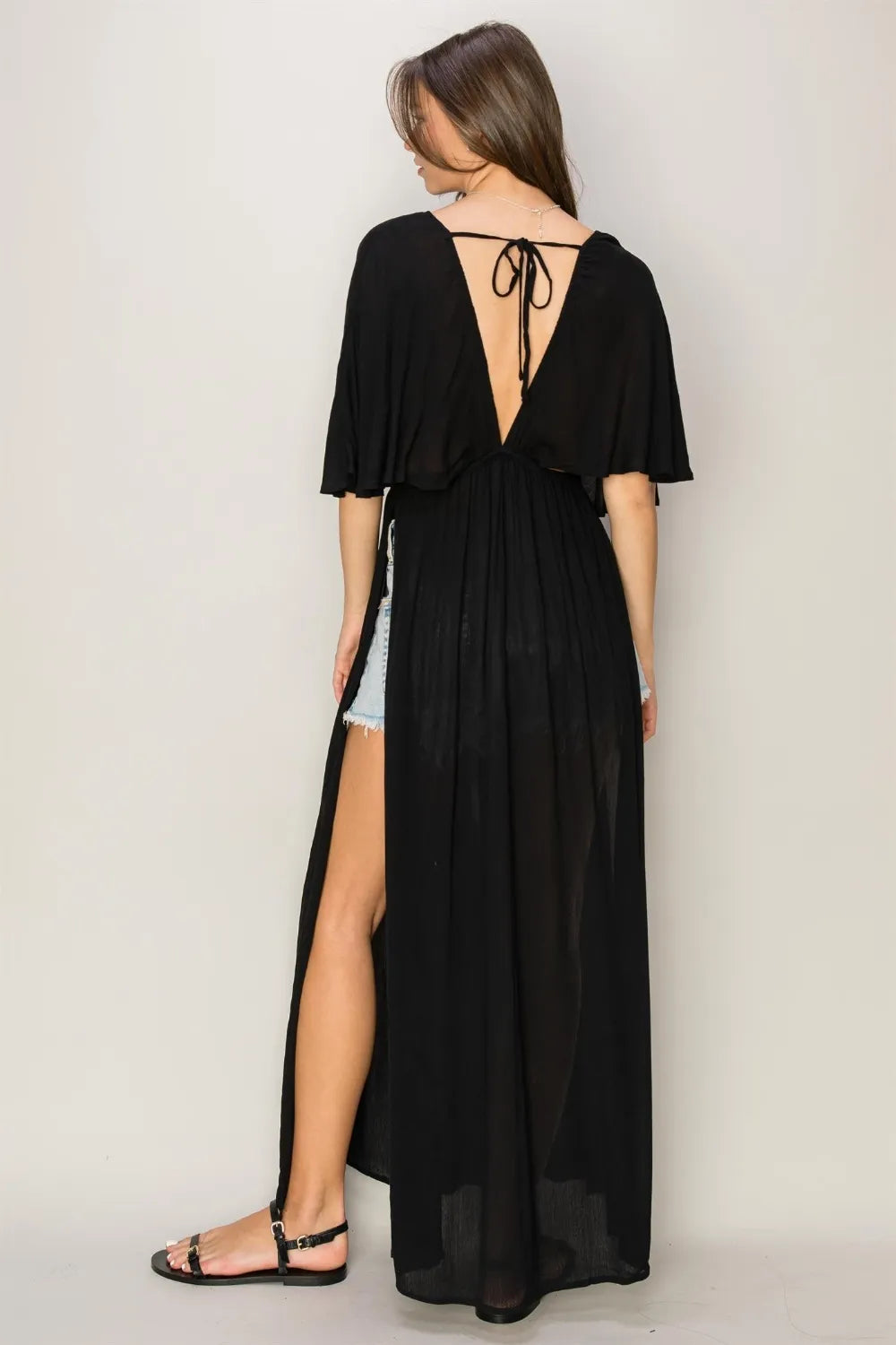 Vestido largo HYFVE con espalda cruzada y aberturas laterales