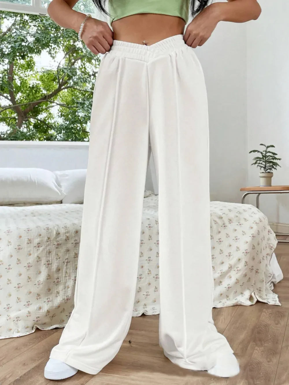 Pantalones de pernera ancha con cintura elástica