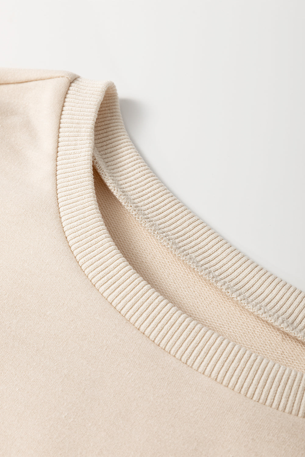 Camiseta de cuello redondo holgada con retazos geométricos de cachemira Jet Stream