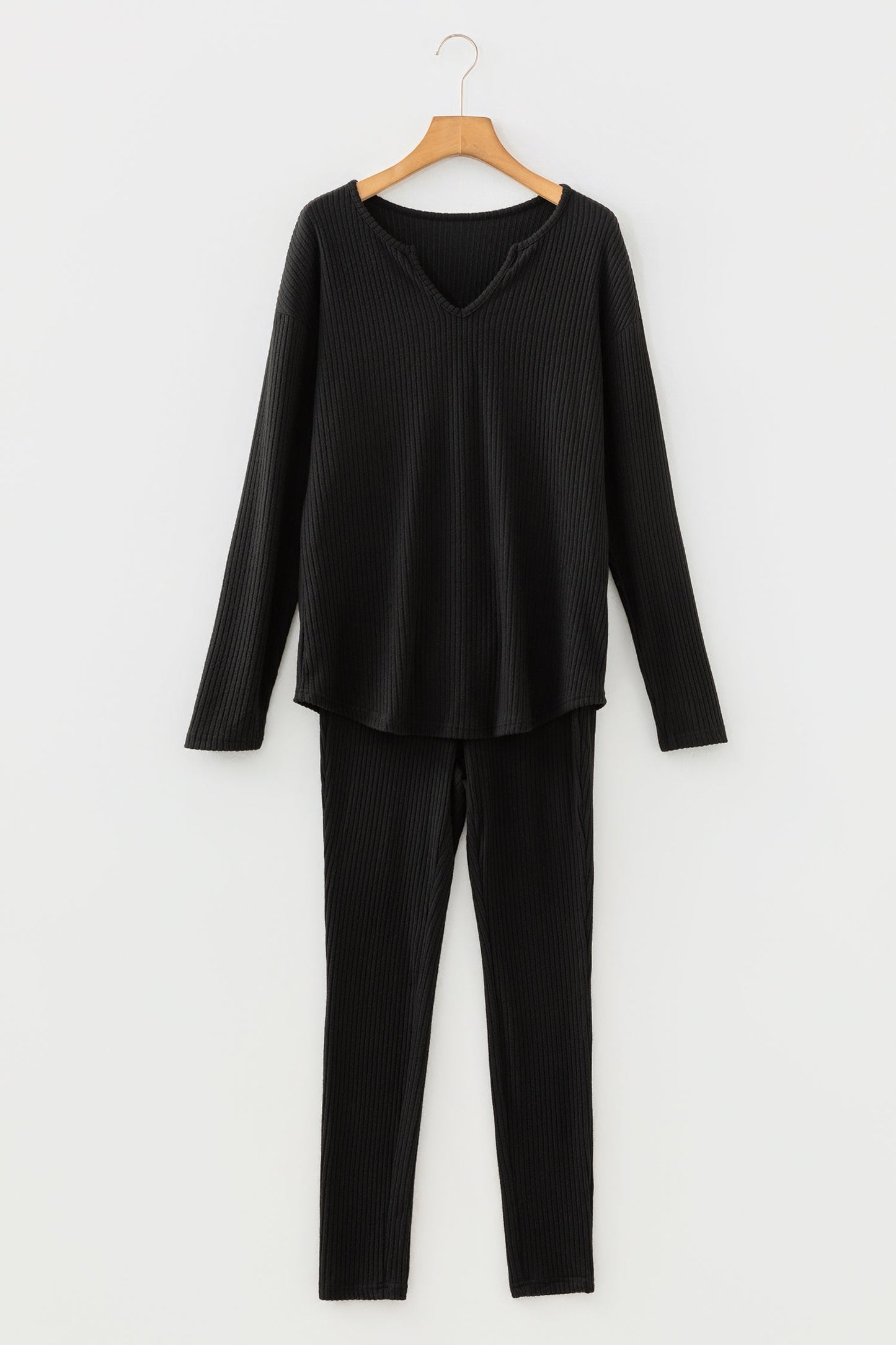 Conjunto de dos piezas de salón de leggings y manga larga de punto acanalado negro con escote en V
