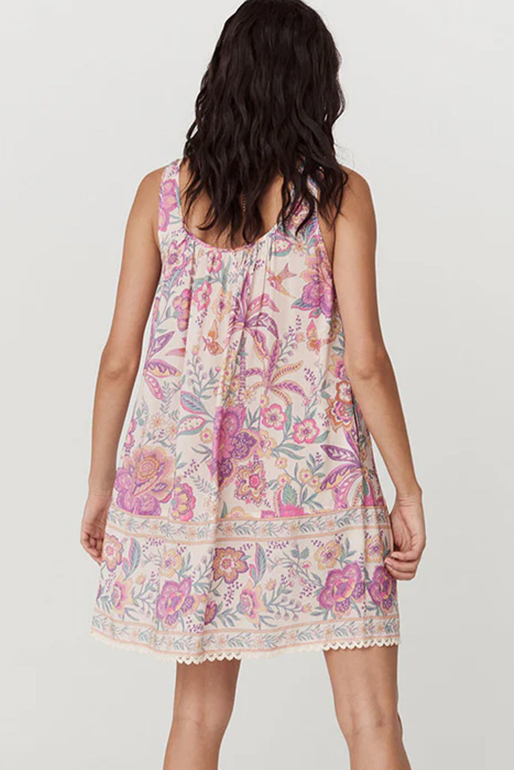 Minivestido sin mangas con cuello de lazo con estampado floral multicolor y flecos
