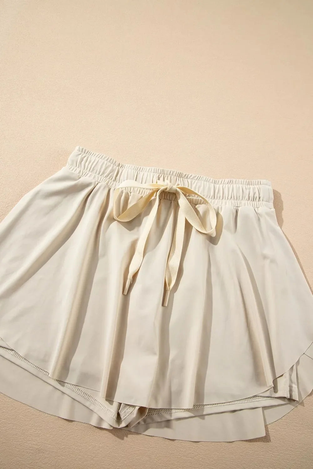 Pantalones cortos deportivos forrados de cintura alta con cordón