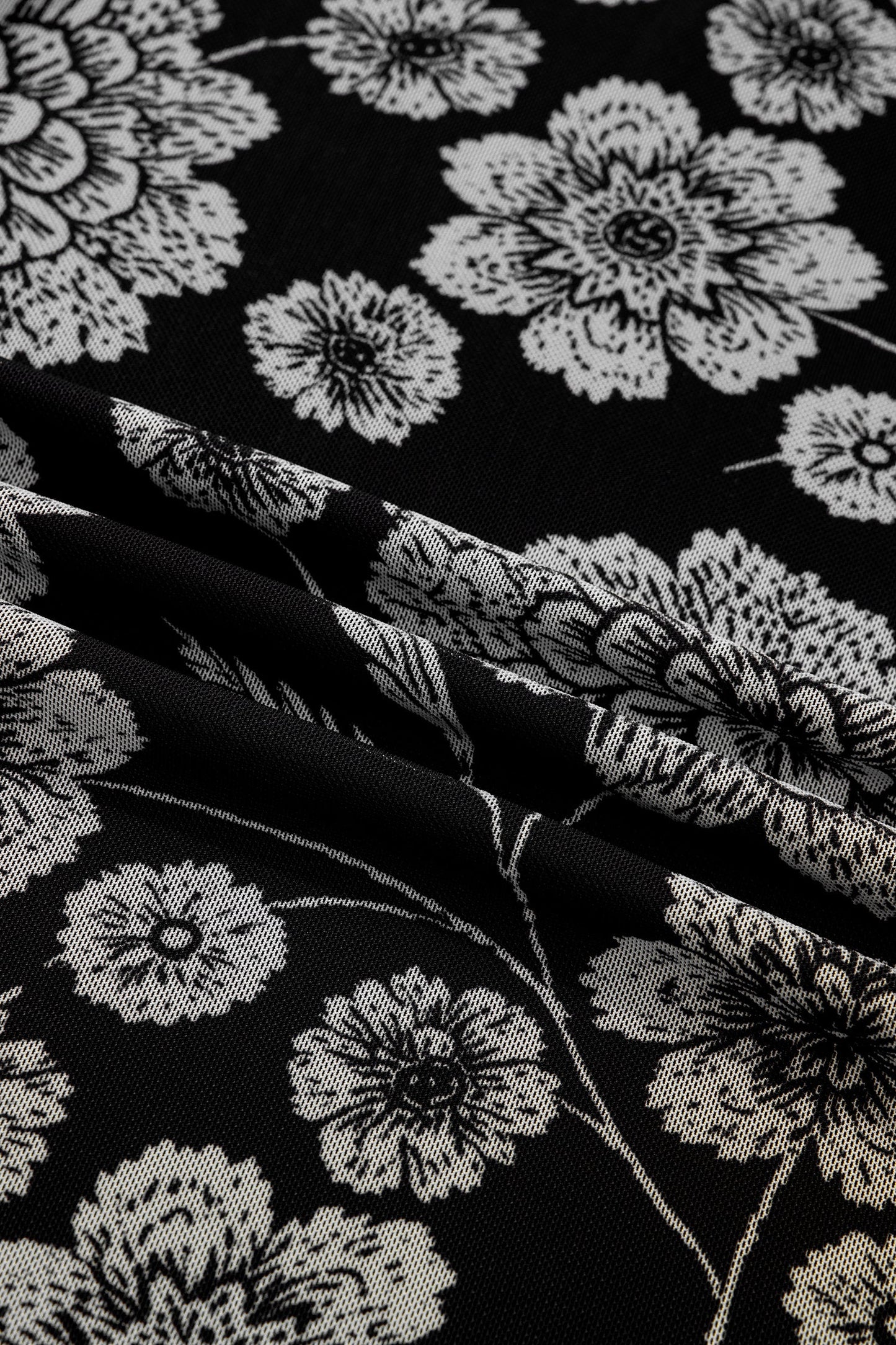 Top de malla de manga larga con agujero para el pulgar y estampado floral marrón