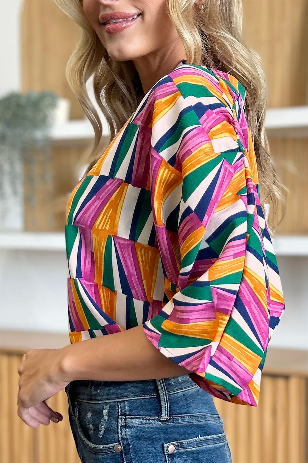 Top de manga dolman con muescas y estampado geométrico "Double Take" de talla grande