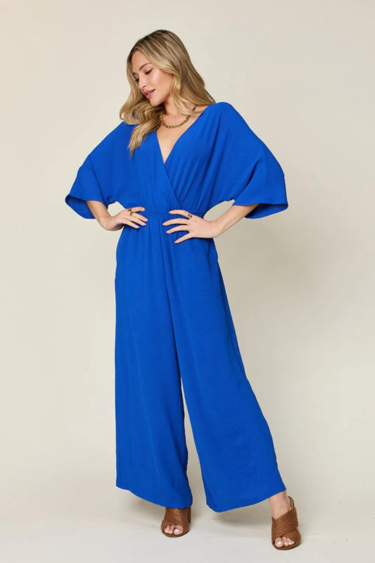 Mono de pierna ancha con escote cruzado y bolsillos Double Take de talla completa