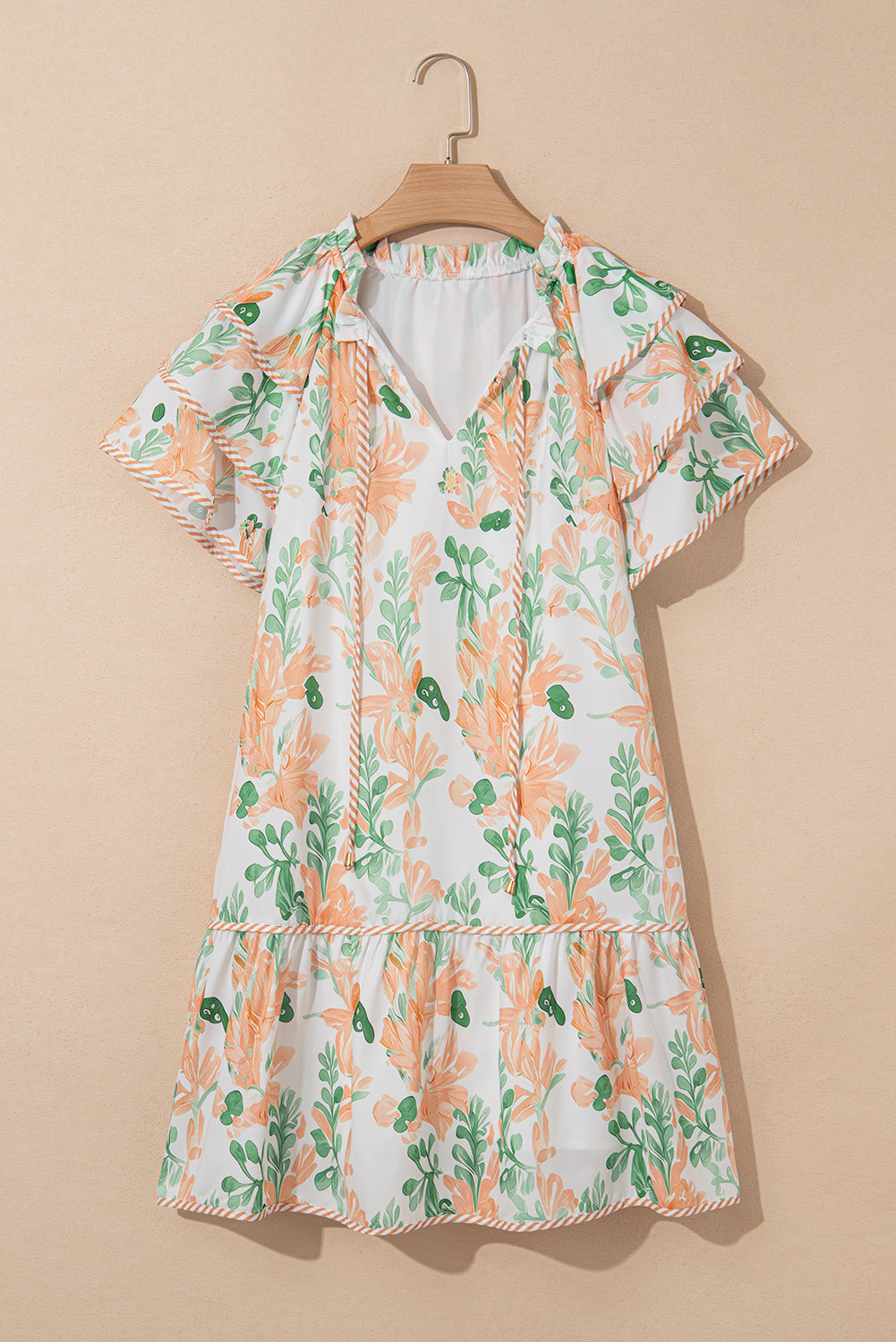 Minivestido con cuello anudado, manga con volantes en el borde en contraste y estampado floral azul cielo