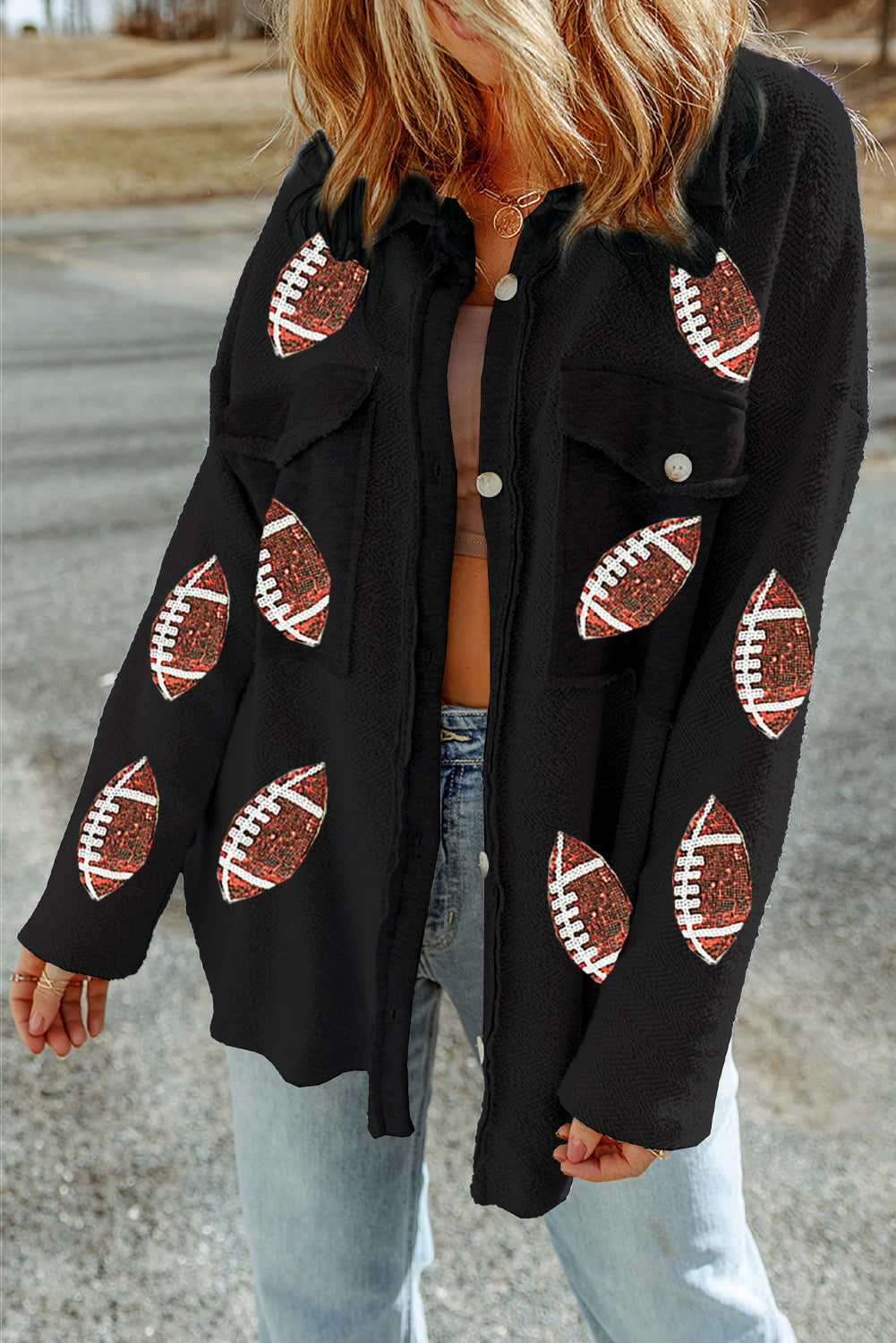 Chaqueta camisera negra de lana con estampado de fútbol y botones en la parte delantera