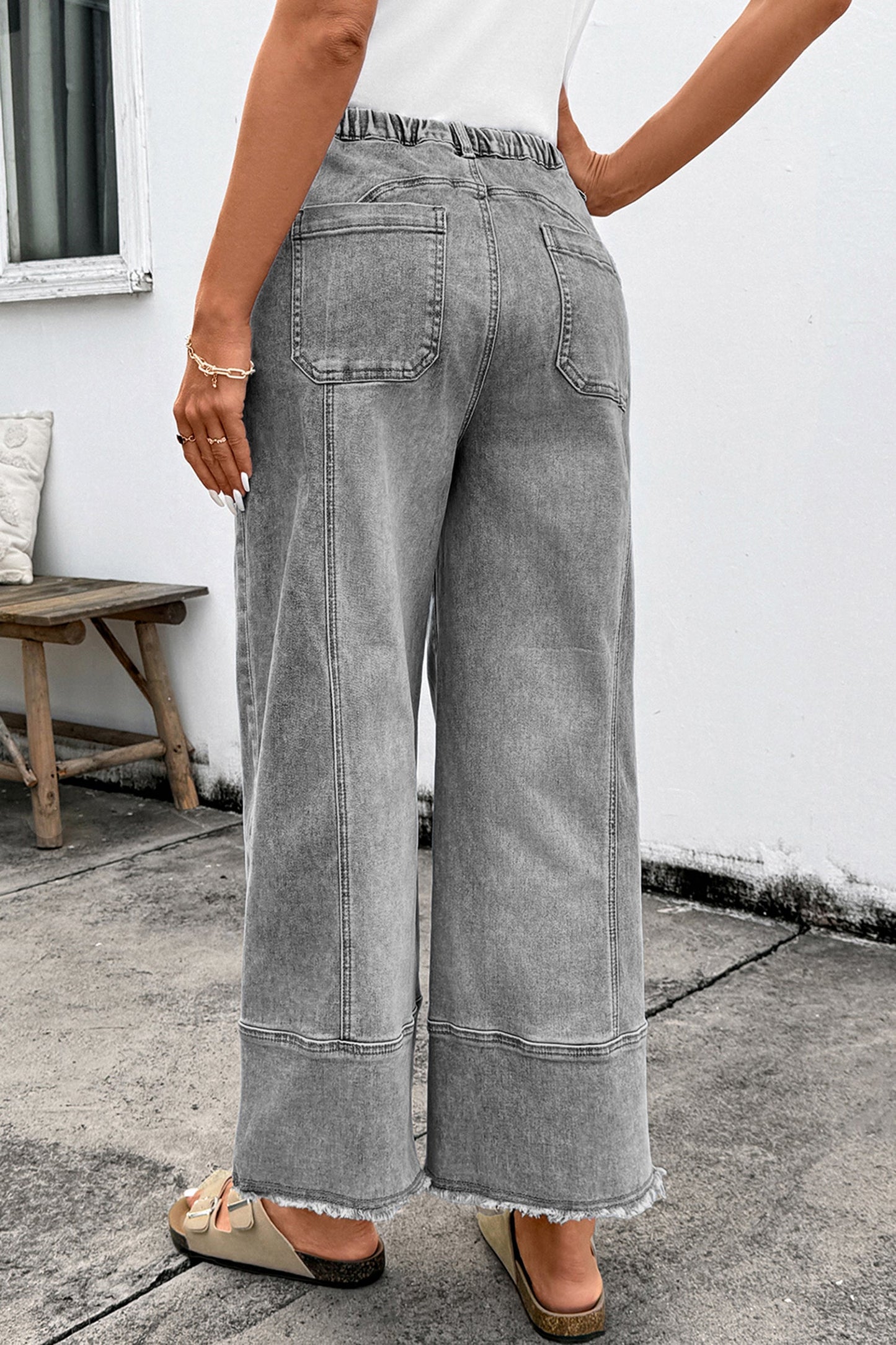 Pantalones vaqueros de pierna ancha con cordón azul de Prusia, detalle de costura y dobladillo sin rematar