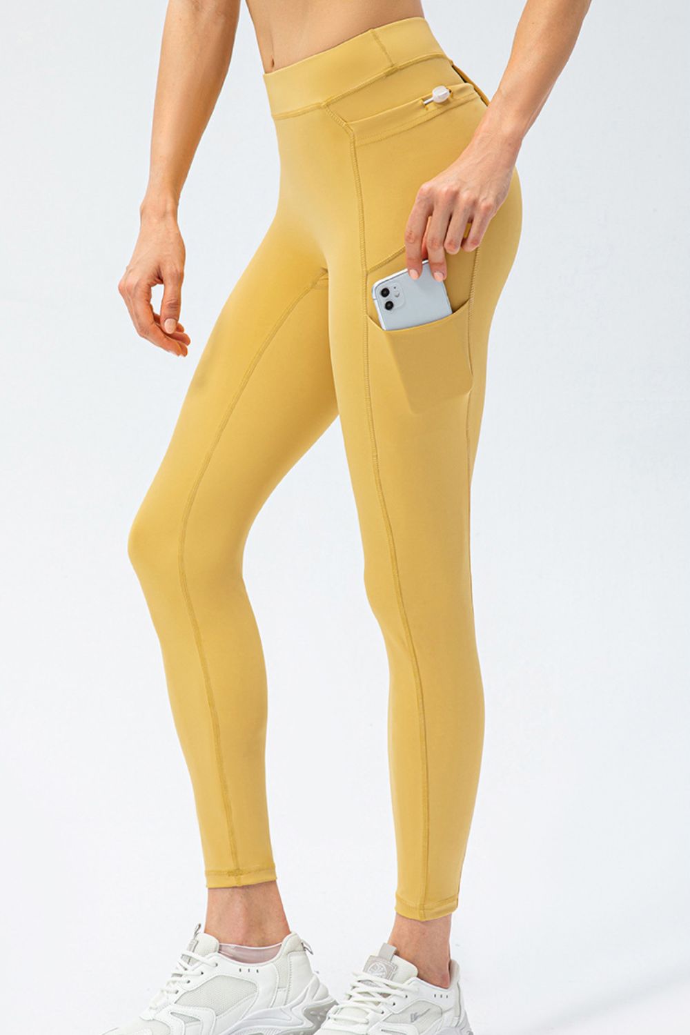 Pantalones deportivos largos de talle alto y corte entallado con bolsillos