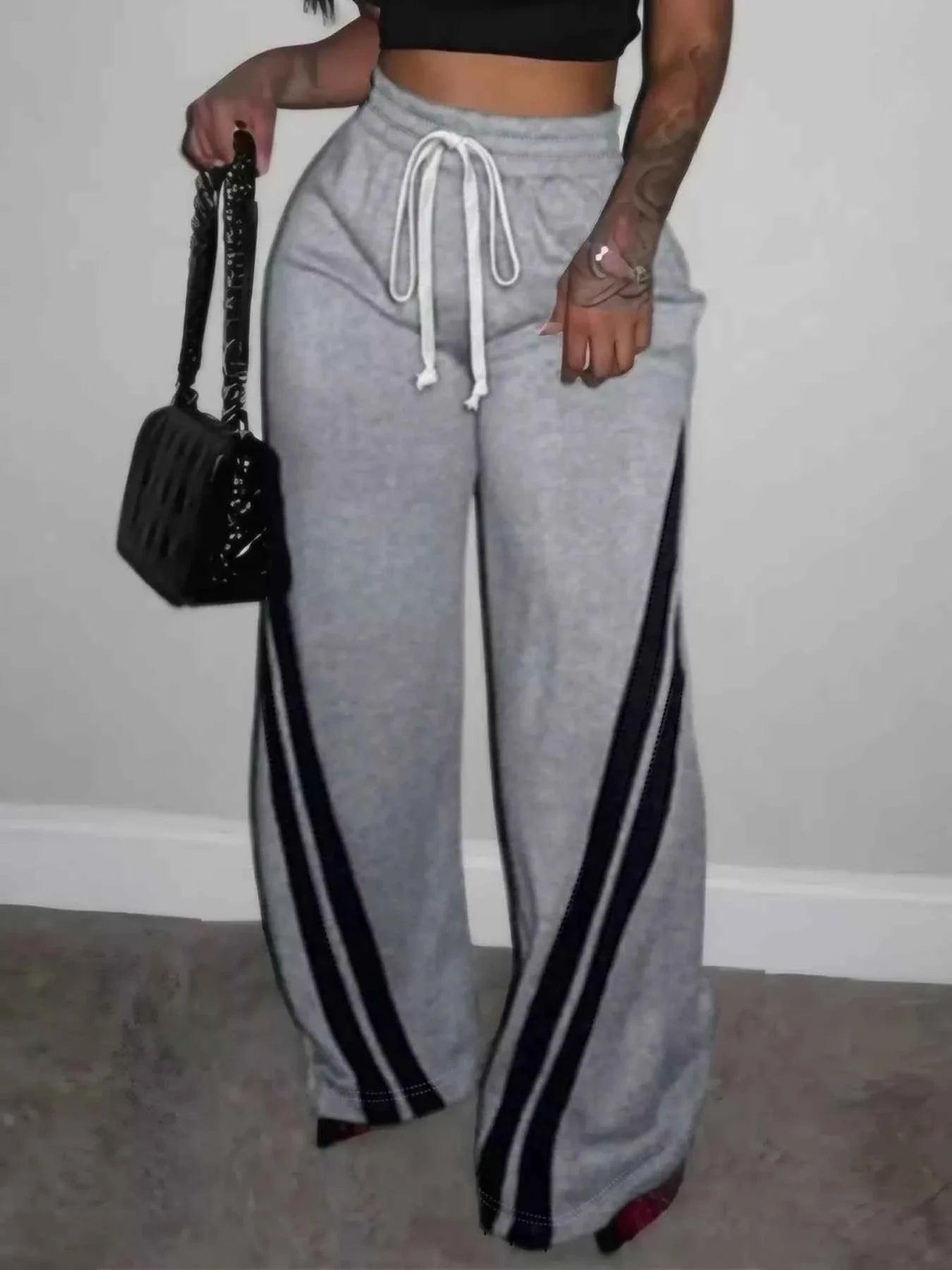 Pantalones de pernera ancha con rayas y contraste de talla grande
