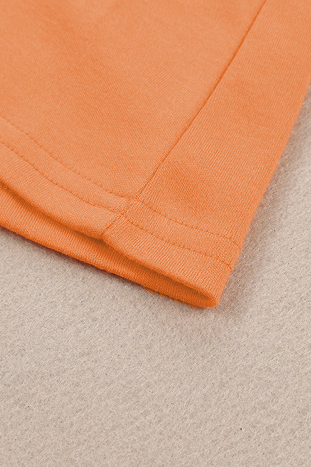 Top naranja liso de manga larga con cuello redondo