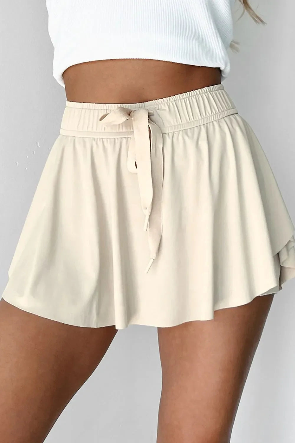 Pantalones cortos deportivos forrados de cintura alta con cordón