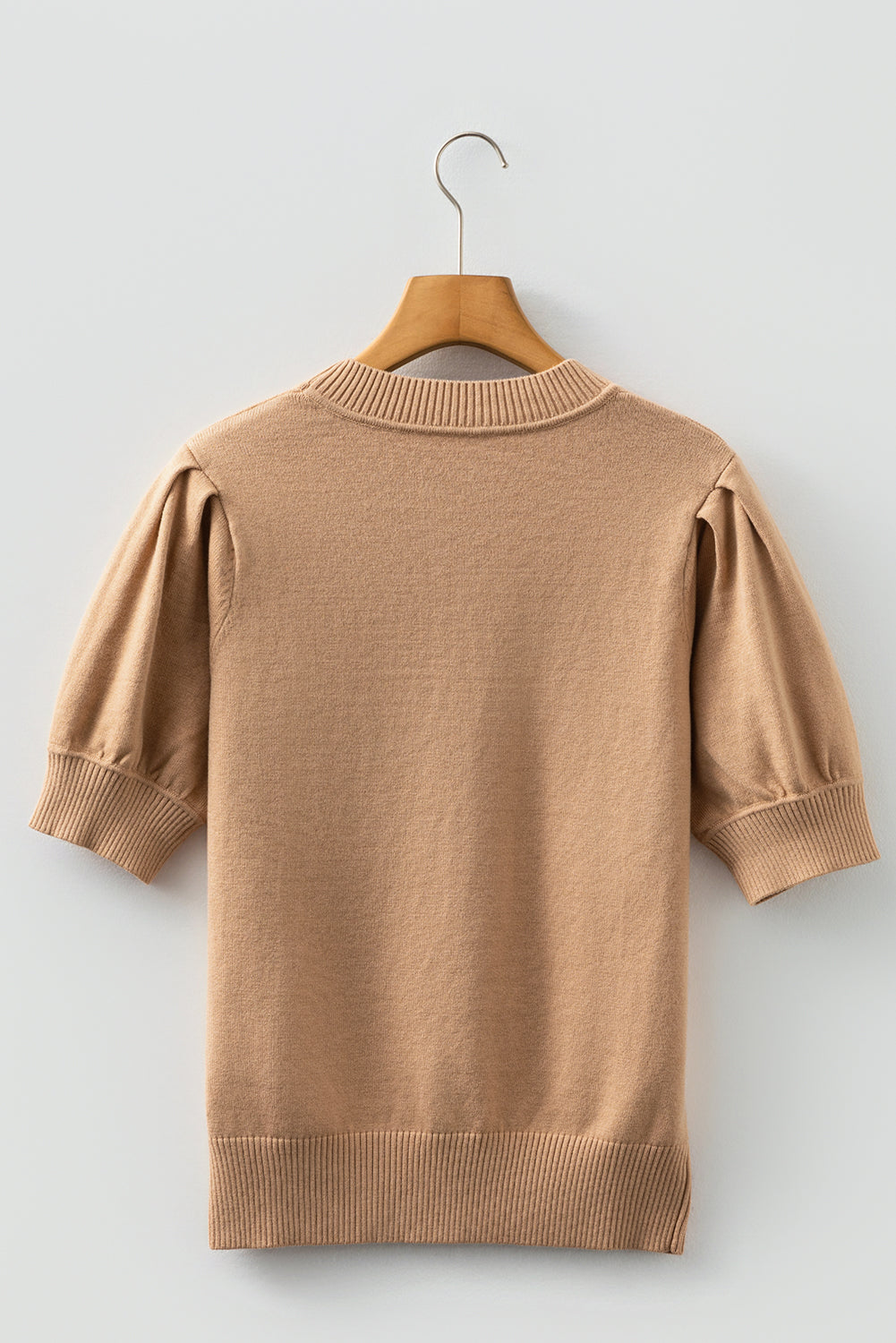 Suéter de punto de color liso beige francés claro con manga corta abullonada
