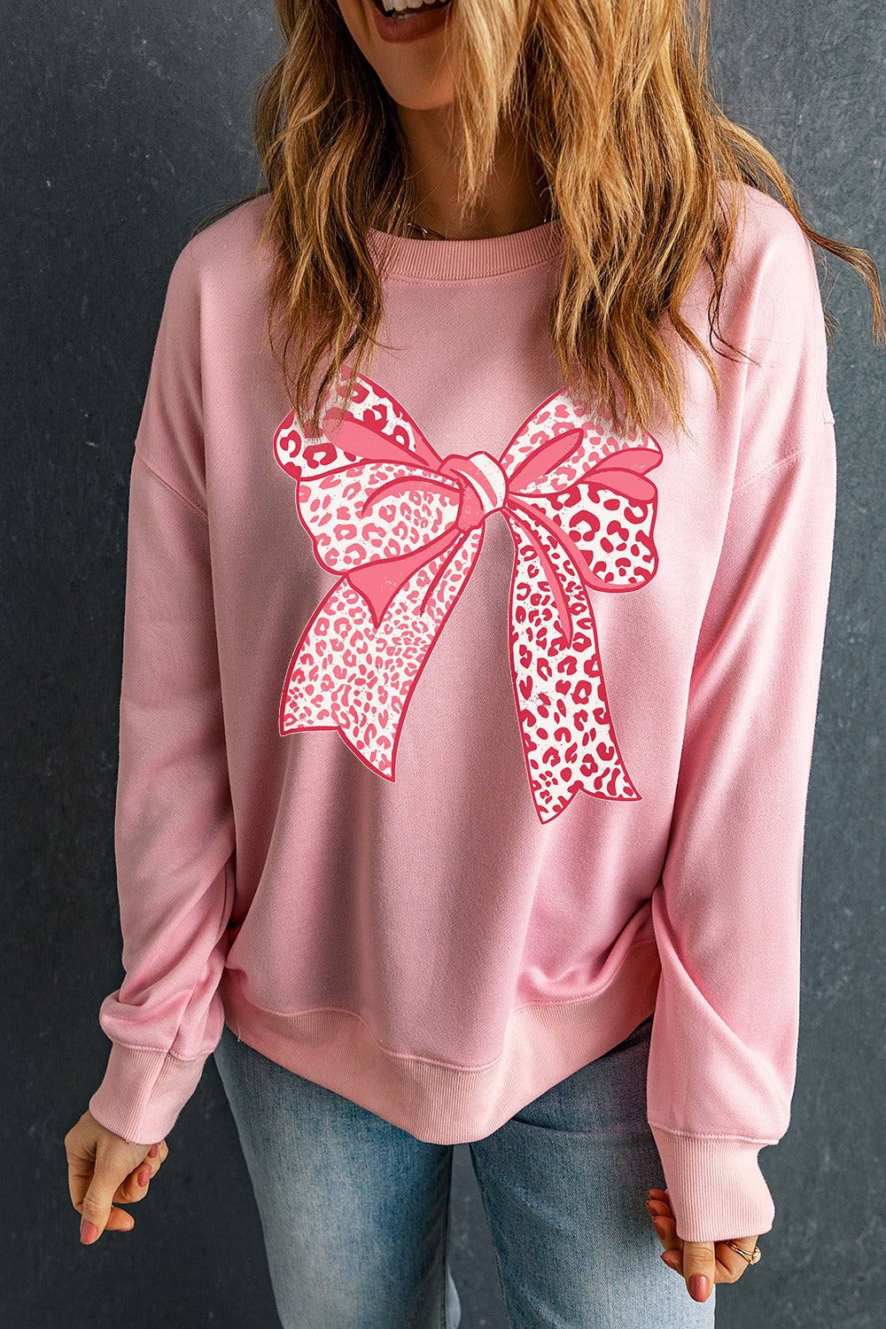 Sudadera de cuello redondo y manga larga con gráfico de lazo