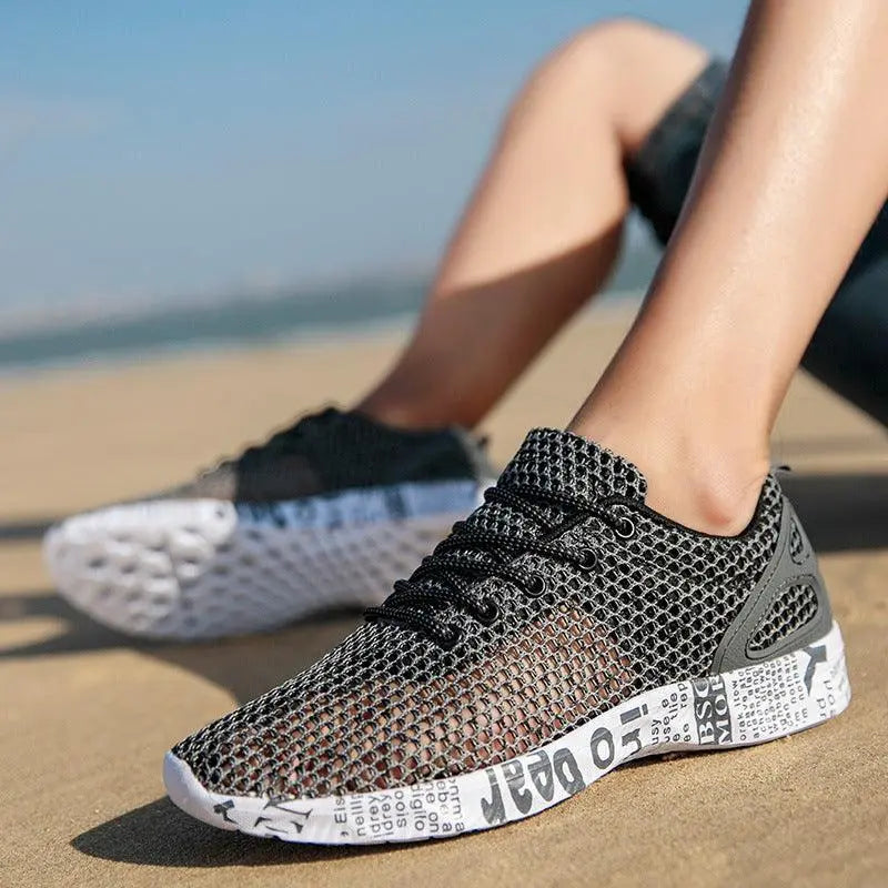 Zapatos casuales para hombre, zapatillas transpirables, zapatos de tabla calados con cordones